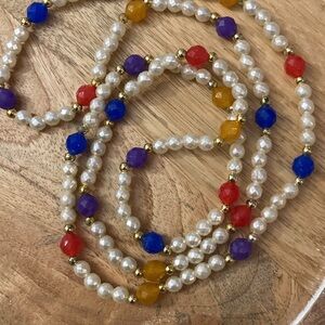 Pearl necklace with colorful beads blue red orange gold purple